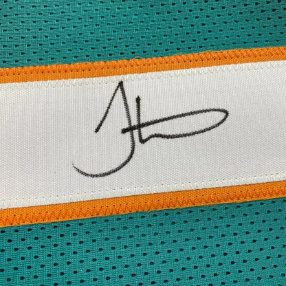 Autographed teal and orange Tyreek Hill custom jersey for professional sports fans