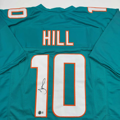 Autographed Tyreek Hill Miami Teal Football Jersey Beckett BAS COA | Certified Authentic Signed Memorabilia | vintageantiquesgifts.com