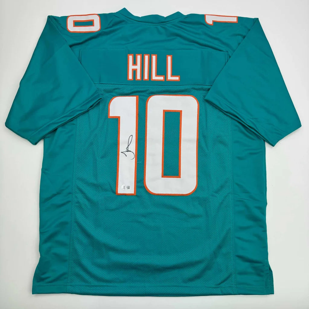 Autographed Tyreek Hill Miami Teal Football Jersey Beckett BAS COA | Hall of Fame Sports Memorabilia | vintageantiquesgifts.com