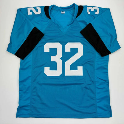 Blue American football jersey with black sleeves and white 32 number for professional sports league