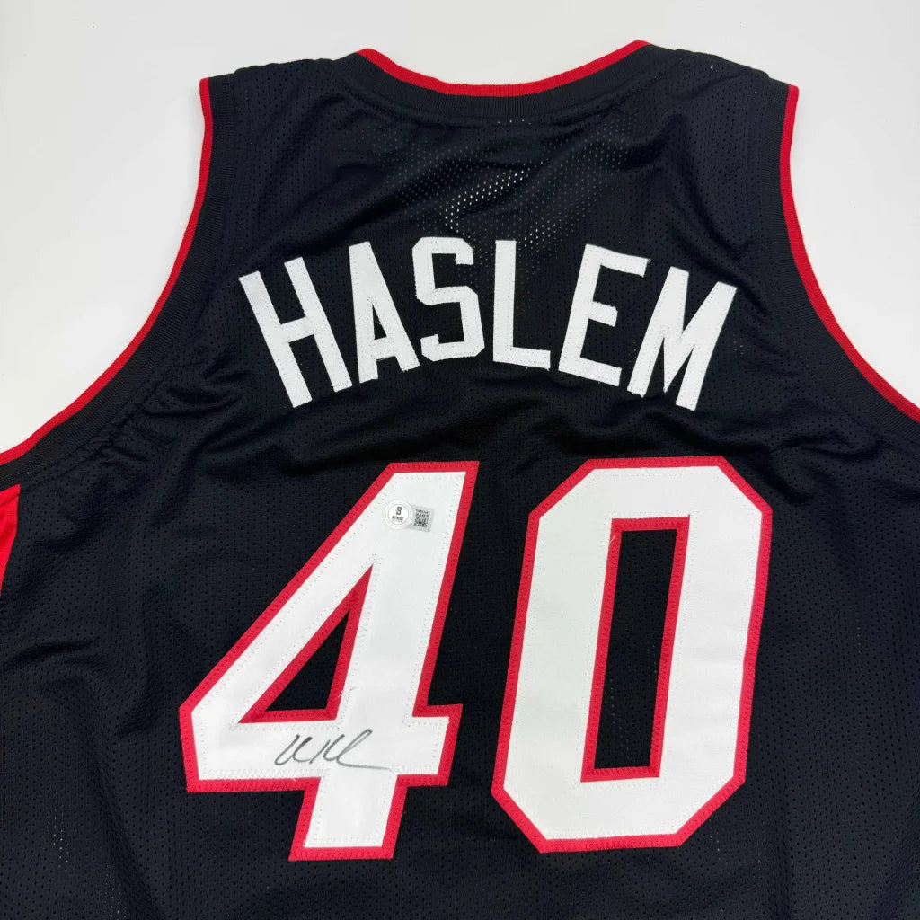 Black basketball jersey with HASLEM 40 white red trim authentic professional sports league Beckett BAS COA