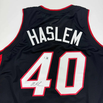 Black basketball jersey with HASLEM 40 white red trim authentic professional sports league Beckett BAS COA