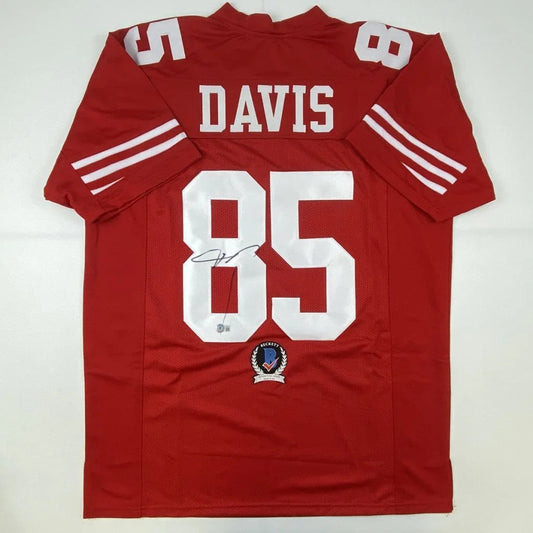 Red custom jersey with white numbers and autograph from professional sports league star