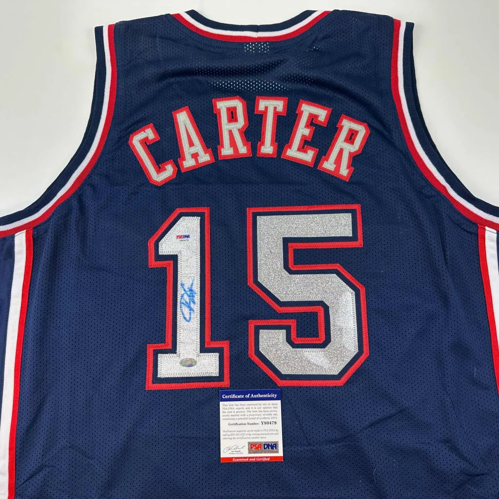 Back of autographed Vince Carter custom navy blue NJ basketball jersey with Carter 15 in silver glitter, PSA/DNA COA
