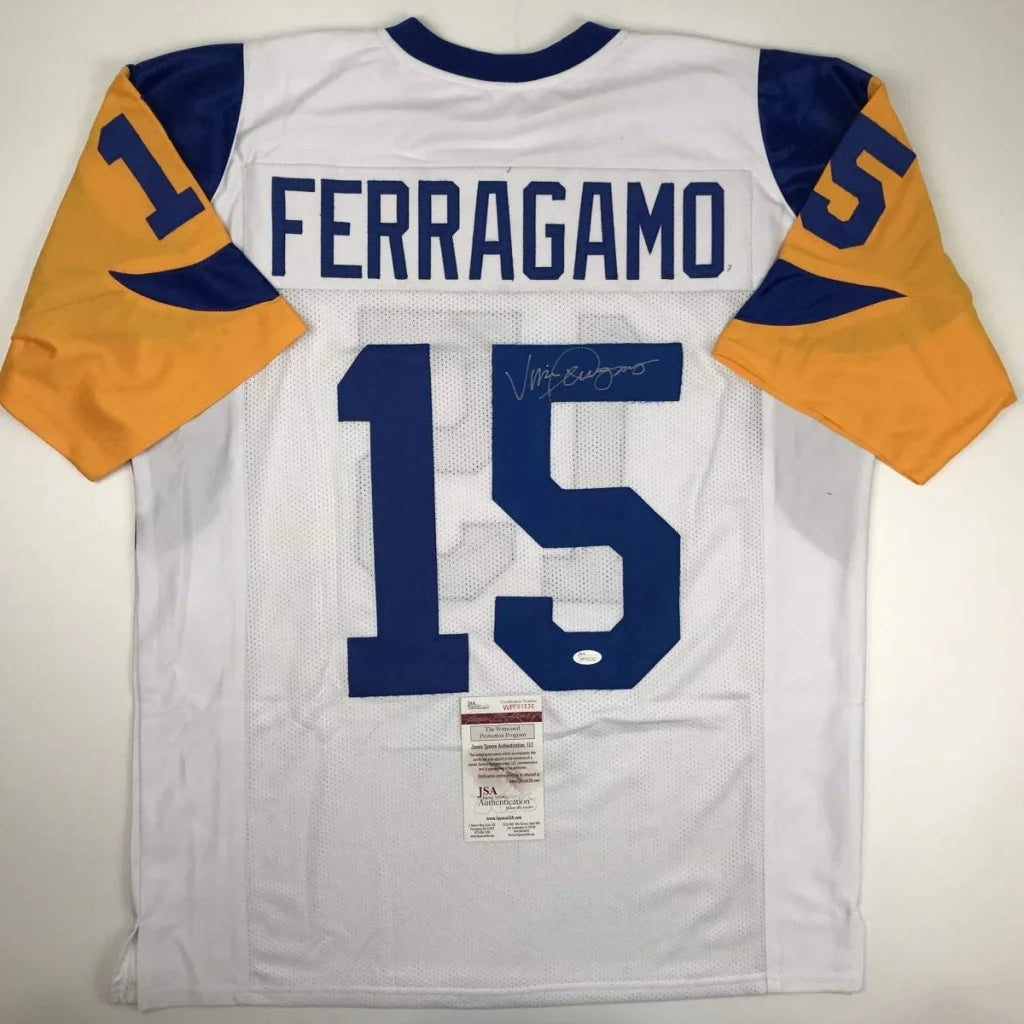Autographed white and blue professional sports league custom jersey with 15 and Ferragamo logo