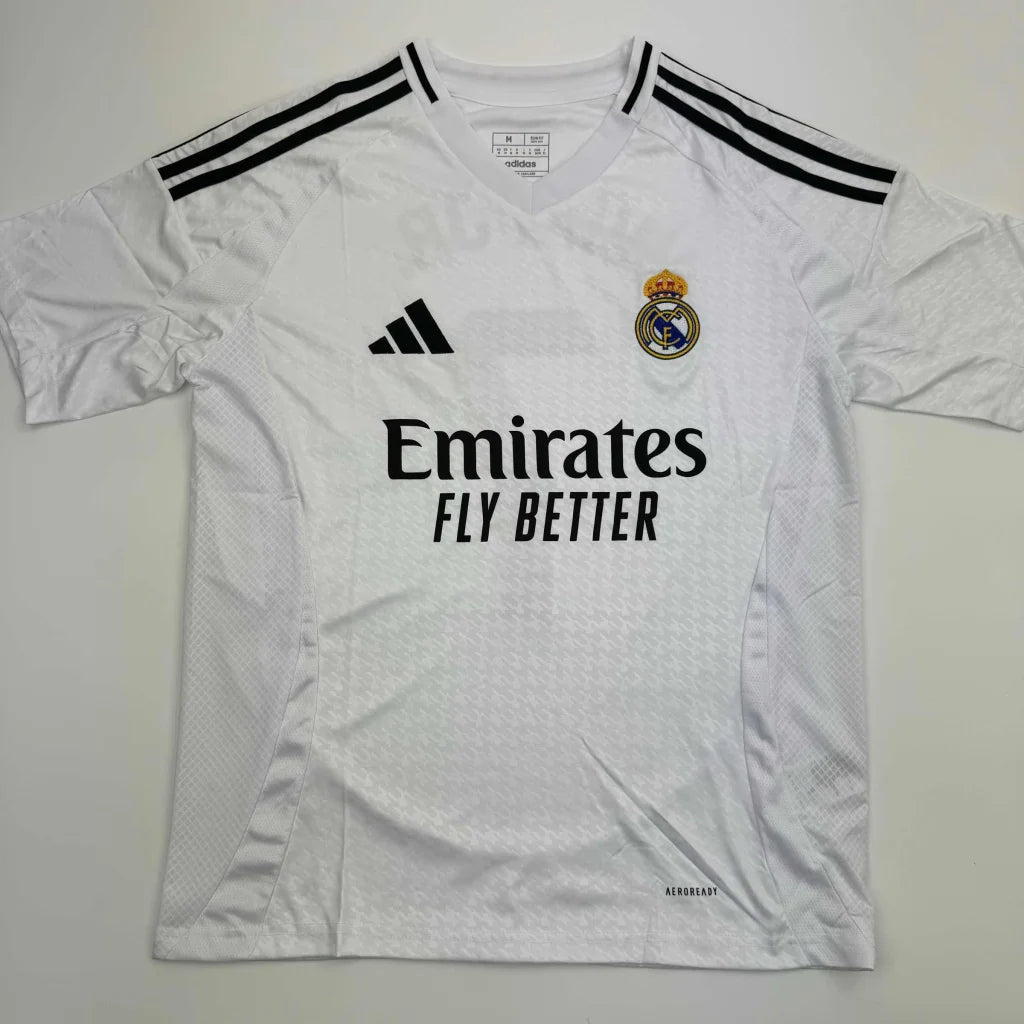 White Real Madrid home soccer jersey signed by VINI JR, perfect for professional sports collectors