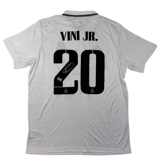 White Real Madrid jersey with VINI JR 20 and third party authentication for authenticity