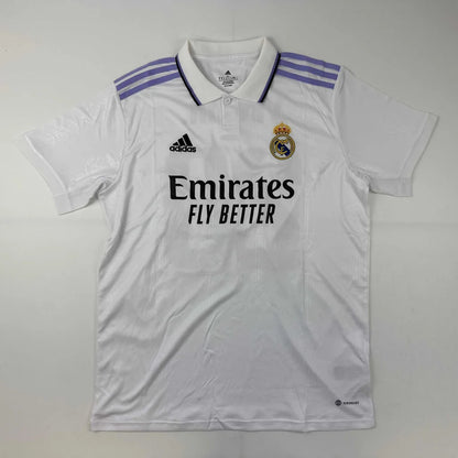 White short-sleeved Real Madrid jersey with purple shoulder stripes, third party authentication