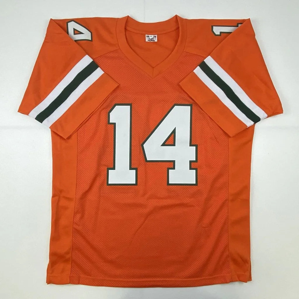 Orange custom jersey with white and green striped sleeves for professional sports league fans