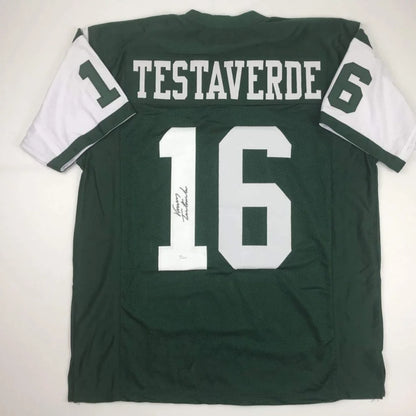 Dark green professional sports league custom jersey with white sleeves and numbers