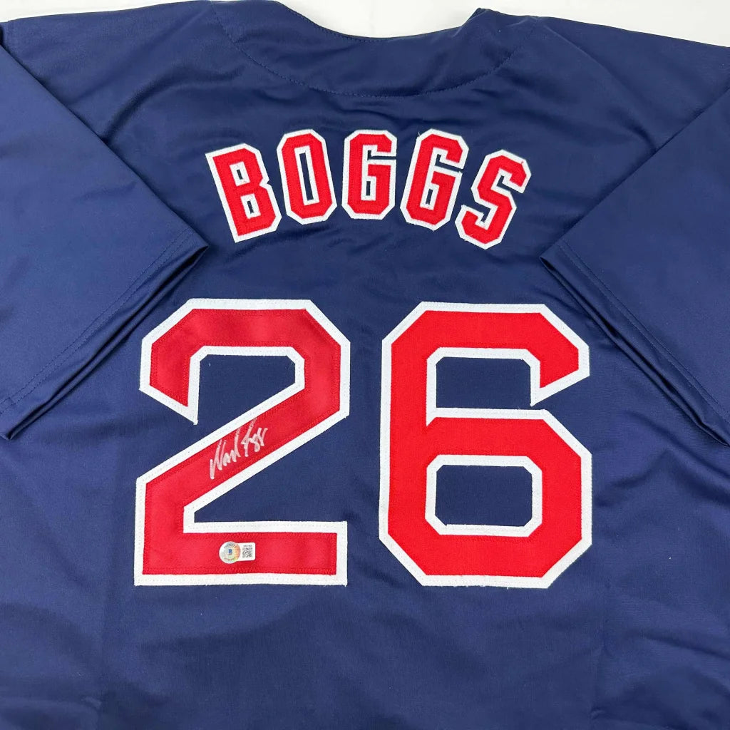 Dark blue Wade Boggs custom jersey from professional sports league with signature on back
