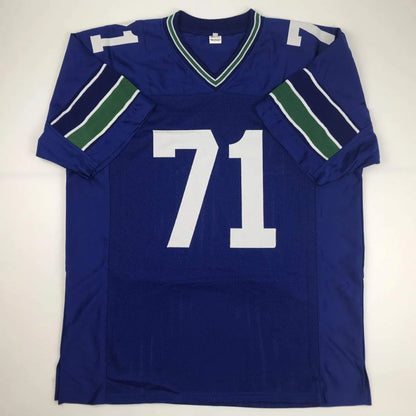 Blue Walter Jones HOF custom jersey with white 71 and green sleeve stripes