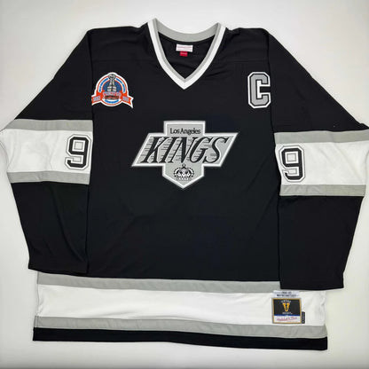 Black Los Angeles Kings jersey with number 9 and captain’s C, third party authentication