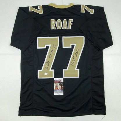 Back of autographed Willie Roaf HOF 2012 custom black New Orleans jersey, number 77