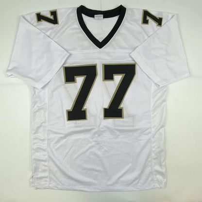 White and black Willie Roaf HOF Orleans white jersey with number 77 and JSA COA