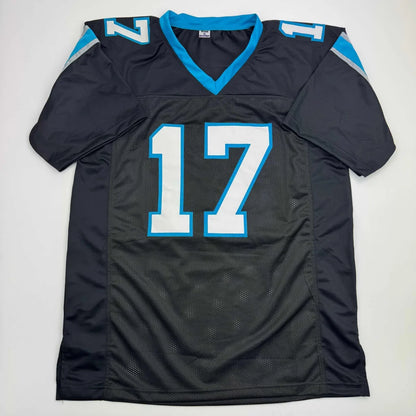 Autographed black and teal carolina panthers custom jersey number 17 signed by xavier legette from a professional sports league