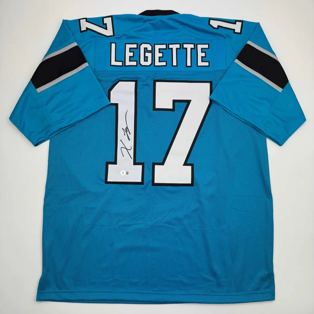 Back side of a vibrant blue custom jersey featuring white and black lettering with legette 17 from a professional sports league