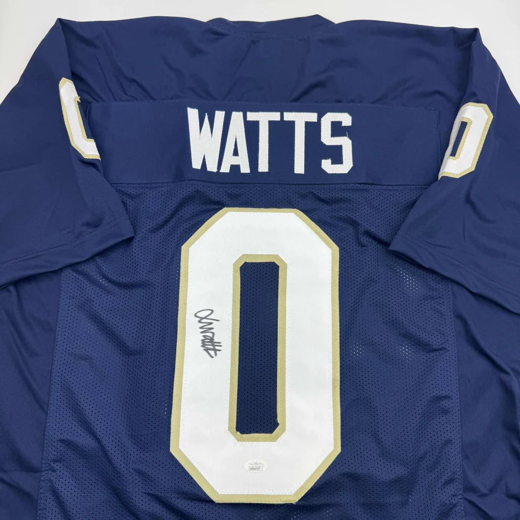 Back view of navy blue custom jersey with white and gold trim featuring watts 0 from professional sports league football