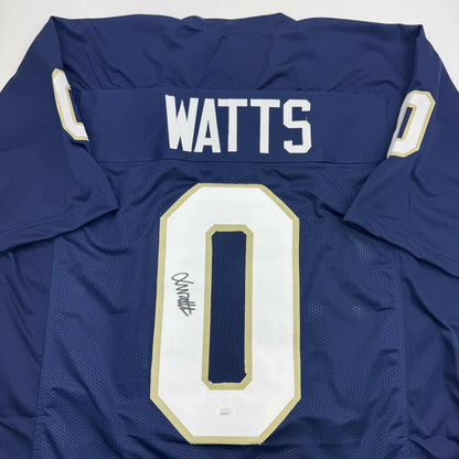 Back view of navy blue custom jersey with white and gold trim featuring watts 0 from professional sports league football