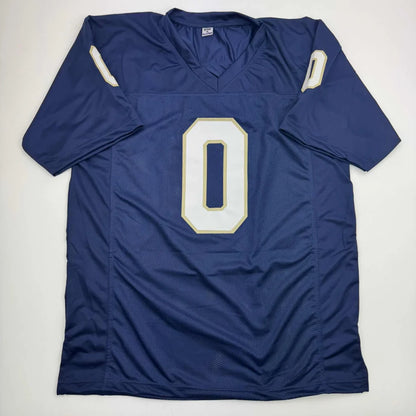 Navy blue mesh custom football jersey with white and gold number 0 autographed by Xavier Watts from professional sports league