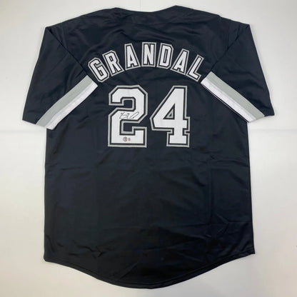 Black professional sports league custom jersey with GRANDAL 24 and striped sleeves