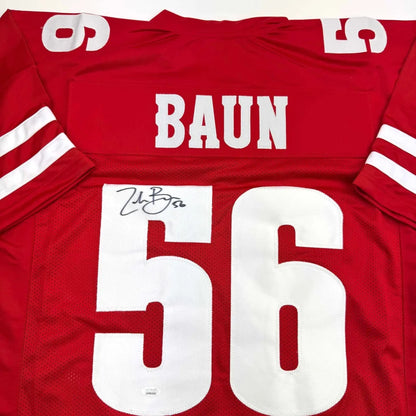 Back of autographed Zack Baun red 49ers custom jersey with number 56, JSA COA
