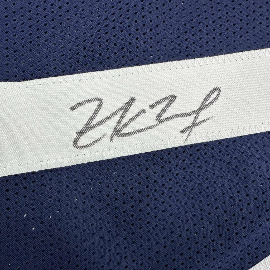 Dark blue mesh fabric with white strip and grey signature on Dallas Cowboys custom jersey