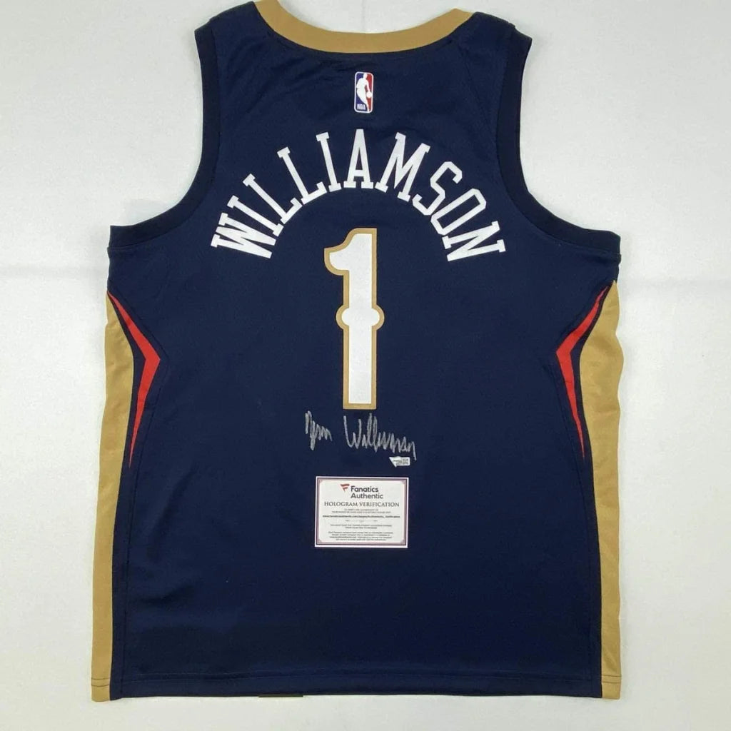 Autographed Zion Williamson New Orleans Pelicans navy blue Nike Swingman jersey with gold red accents and number 1