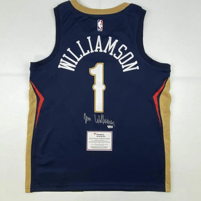 Autographed Zion Williamson New Orleans Pelicans navy blue Nike Swingman jersey with gold red accents and number 1