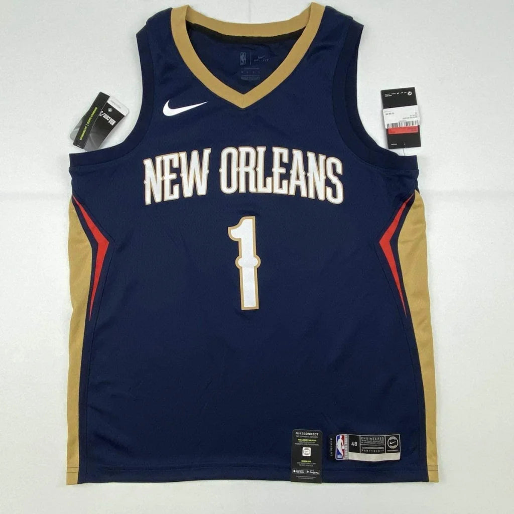 Autographed Zion Williamson New Orleans Pelicans navy blue Swingman Nike jersey with gold accents and number 1