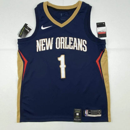 Autographed Zion Williamson New Orleans Pelicans navy blue Swingman Nike jersey with gold accents and number 1