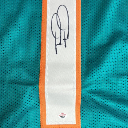 Autographed Tua Tagovailoa Miami Dolphins jersey with orange and white trim