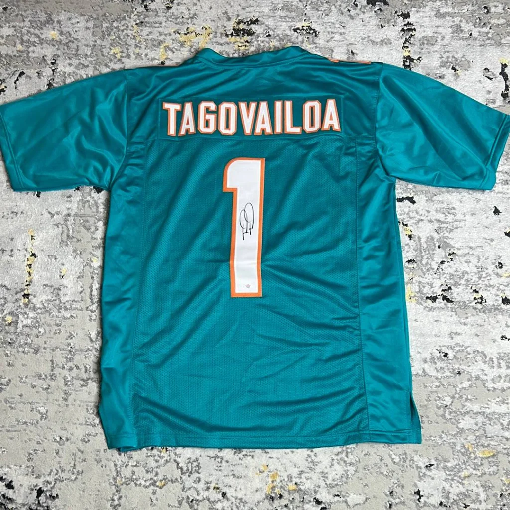 Autographed Tua Tagovailoa Miami Dolphins jersey with signature and certificate