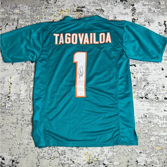 Autographed Tua Tagovailoa Miami Dolphins jersey with signature and certificate