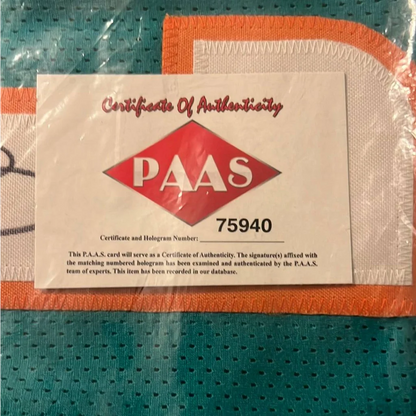 Certificate of Authenticity with PAAS logo and hologram number 75940 for autographed Tua Tagovailoa Miami Dolphins jersey
