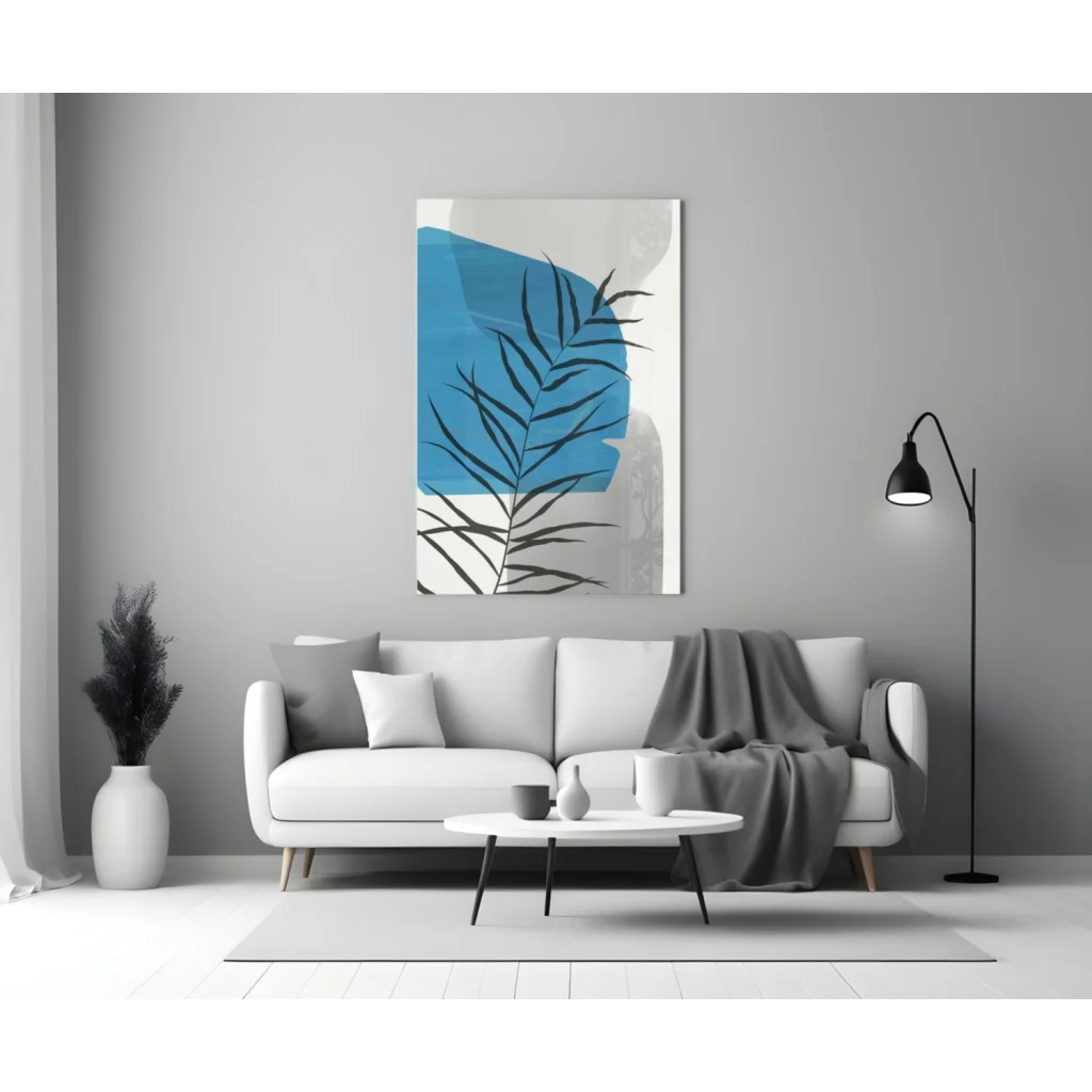 Modern bold blue palm frond glass wall art with black leaf silhouettes on white