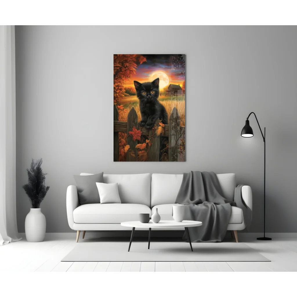 Black kitten with glowing yellow eyes on fence, glass wall art print