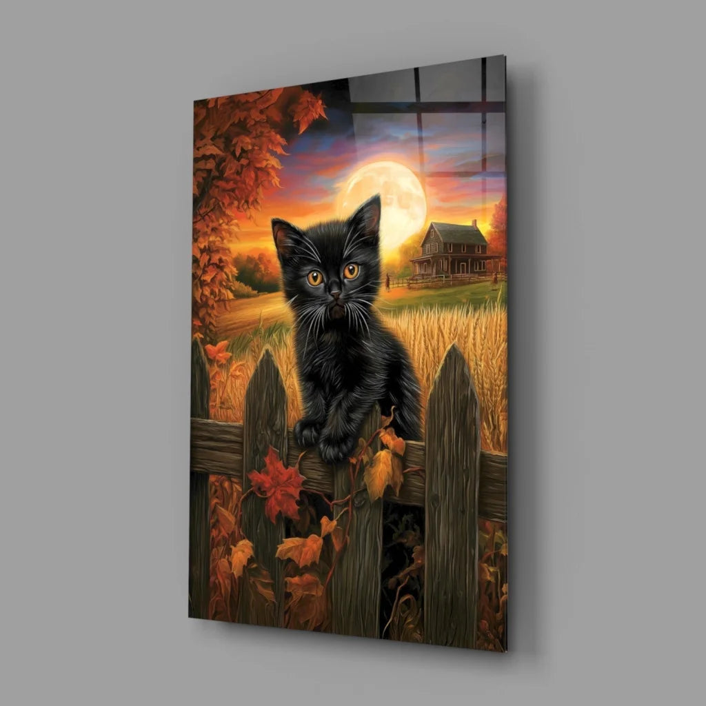 Black kitten with golden eyes on wooden fence, autumn full moon glass wall art