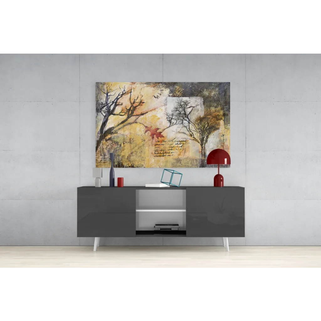 Modern gray sideboard with white legs under autumn trees wall art