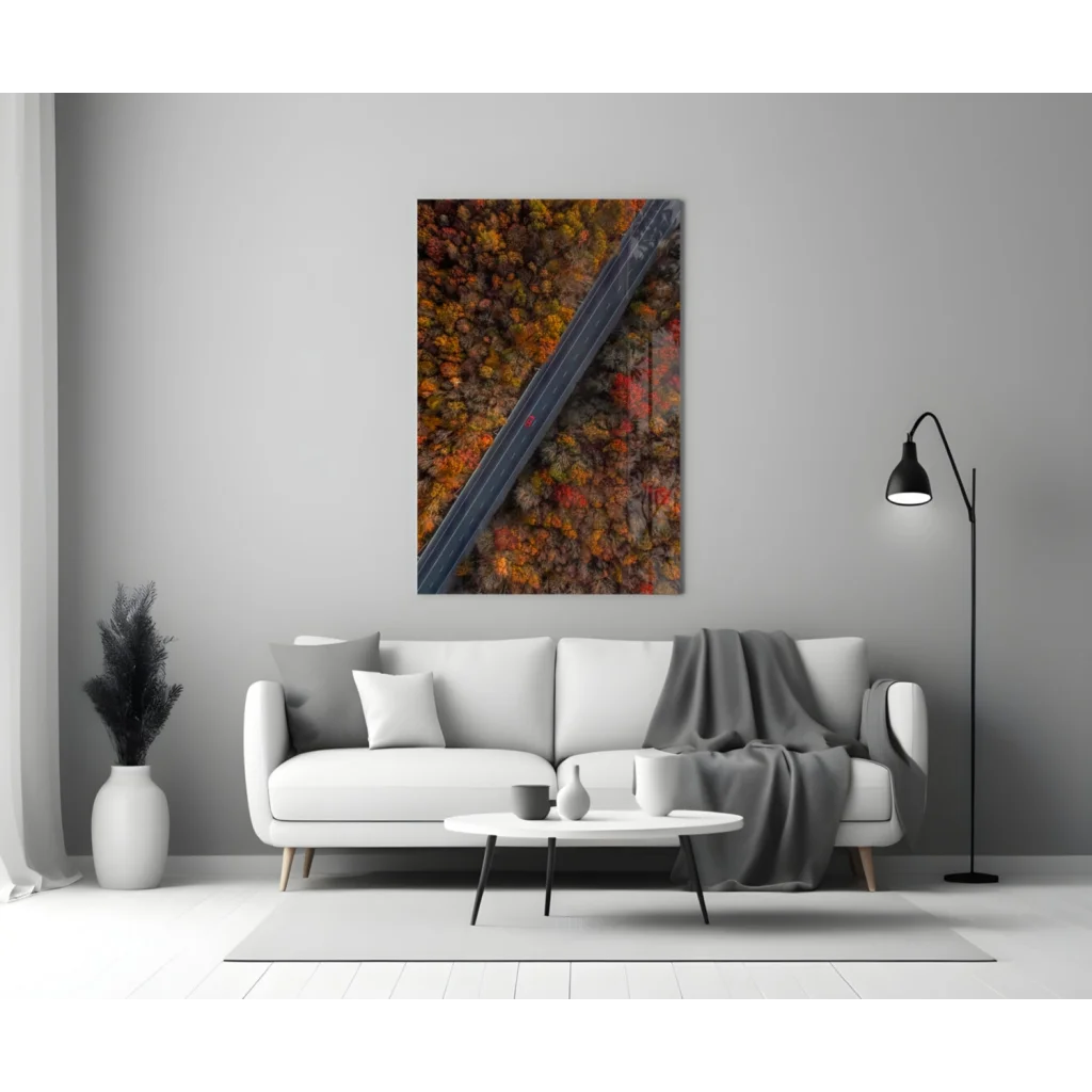 Vibrant autumn foliage with diagonal railway track on glass wall art print