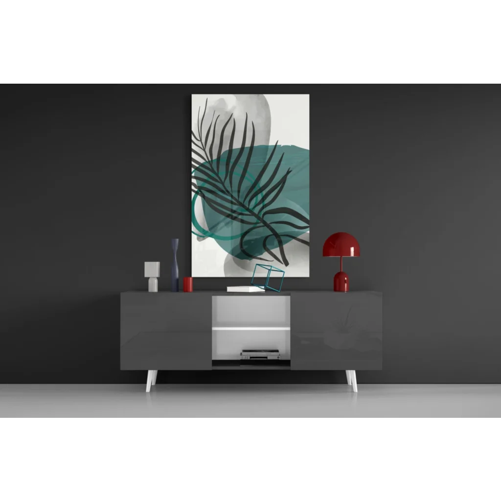 Black leaf silhouette on teal watercolor glass wall art