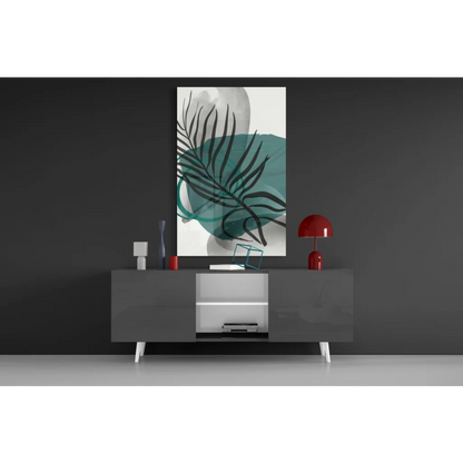 Black leaf silhouette on teal watercolor glass wall art