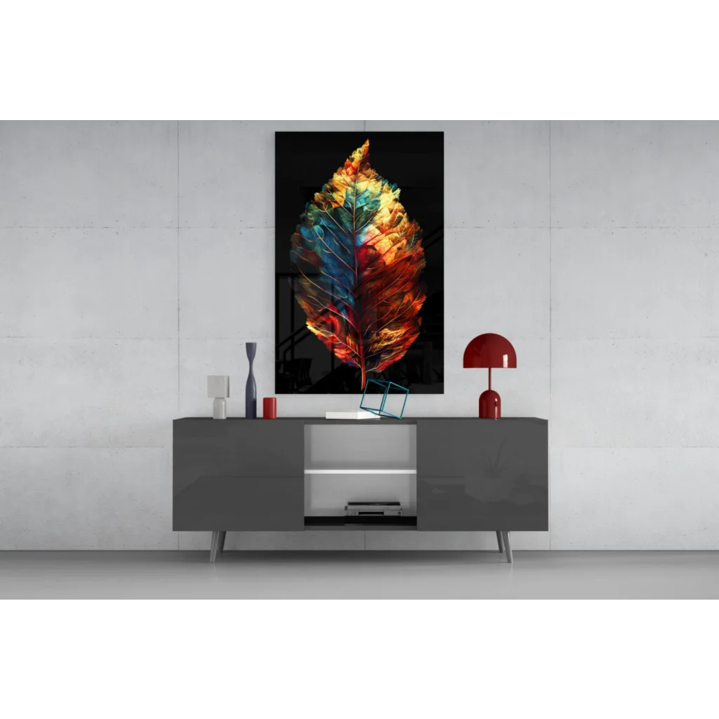 Vibrant fiery leaf glass wall art with orange blue flames on black canvas