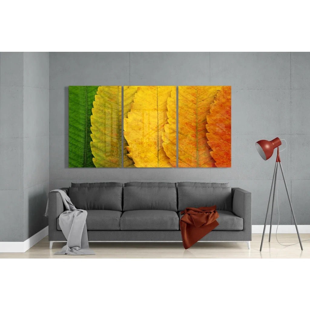 Vibrant autumn leaves glass wall art triptych in green yellow orange
