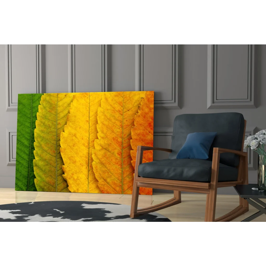 Autumn leaves canvas wall art in green yellow orange on gray wall