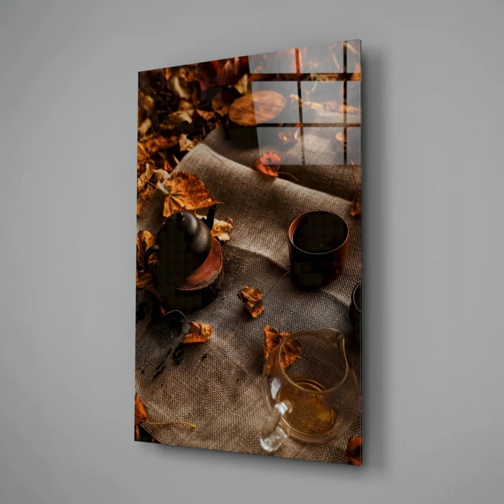 Cozy Autumn Tea Scene glass wall art with rustic leaves and teapot on burlap