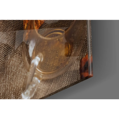 Cozy Autumn Tea Scene glass wall art with amber pitcher and cup