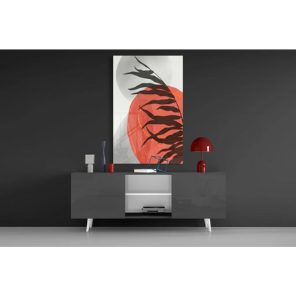 Bold black fern silhouettes on vibrant orange glass wall art