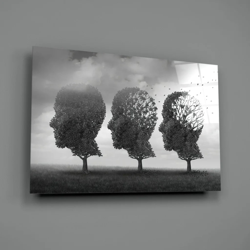 Black and white canvas wall art of three barren tree heads