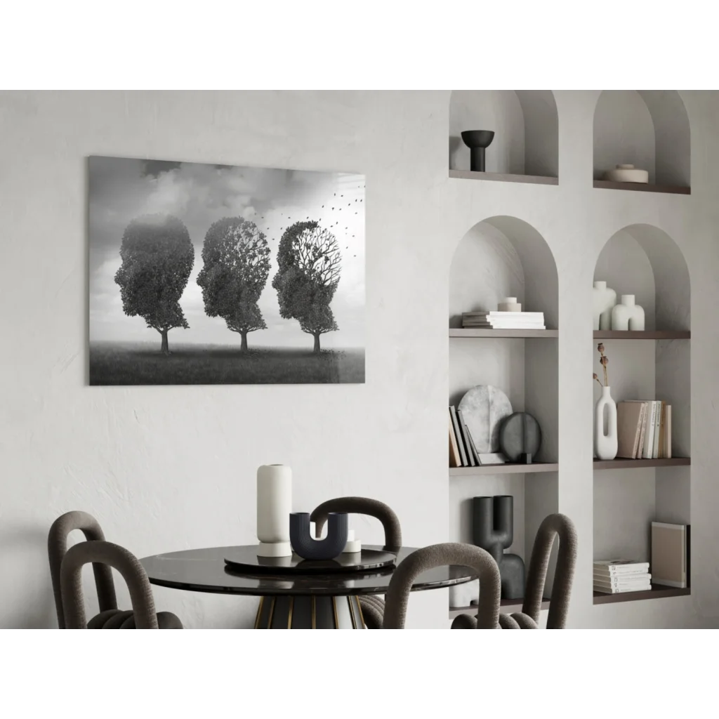 Black and white canvas wall art print of three tree silhouettes as human heads on wall